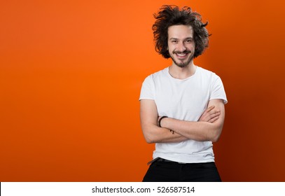 Beautiful Caucasian Man With Funny Hair Over Color Background With Copyspace