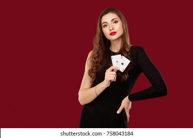 Beautiful Caucasian Woman In Black Dress With Poker Cards Gambling In Casino