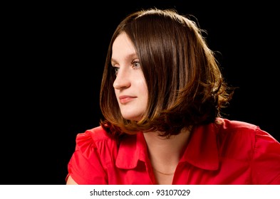 Beautiful caucasian woman with fashion bob haircut. Isolated on black background.