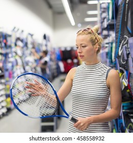 Beautiful Caucasian Woman Shopping Sports Equipment In Sportswear Store.