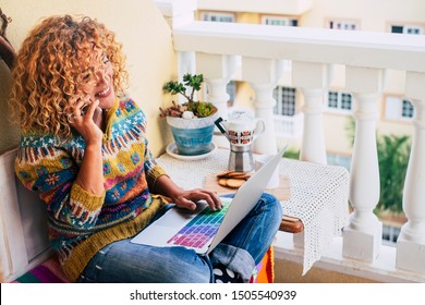 Beautiful Caucasian Woman Smile While Work At Home Outdoor On The Terrace With A Laptop And A Mobile Phone. Stay Connected And Work Away From Office Solution. Live Alternative And Enjoy Life.