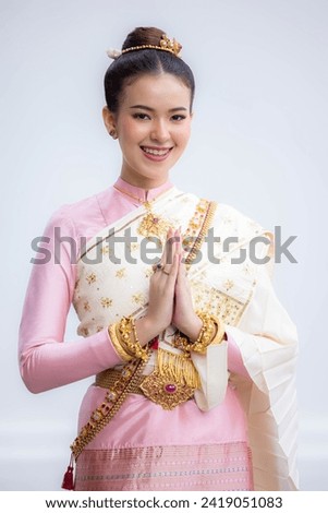 Beautiful caucasian woman in traditional Thai costume culture, Beautiful asian woman with traditional Thai dress culture, Thai girl in traditional Thai costume, Sawasdee, Thailand.