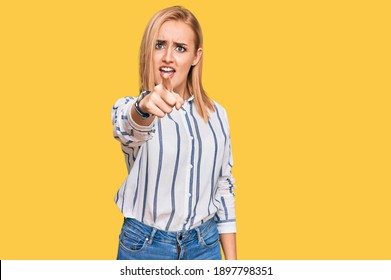 Beautiful Caucasian Woman Wearing Casual Clothes Pointing Displeased And Frustrated To The Camera, Angry And Furious With You 