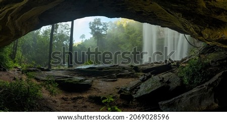 Beautiful cave and waterfalls in the deep forest.