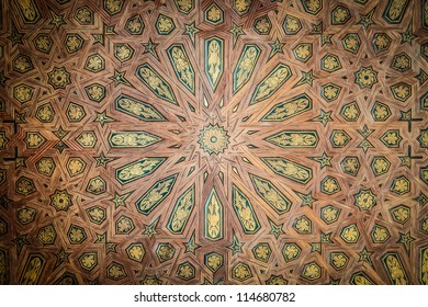 Beautiful Ceiling With Geometric Design. Abstract Wooden Lines With Yellow And Green Details. Seamless Background In Old Arabic Style. Traditional Islamic Art. Indoor Medieval House Decoration.