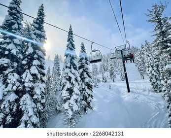 Beautiful chair lift ride up Palisades Tahoe in California - Shutterstock ID 2268042131