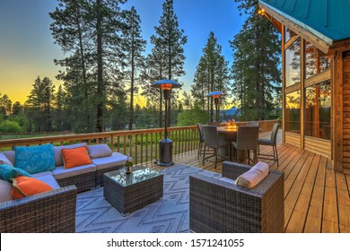 Beautiful chalet cider home exterior during evening with new deisgn outdoor furniture.