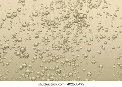 Beautiful champagne bubbles in a cold crystal glass