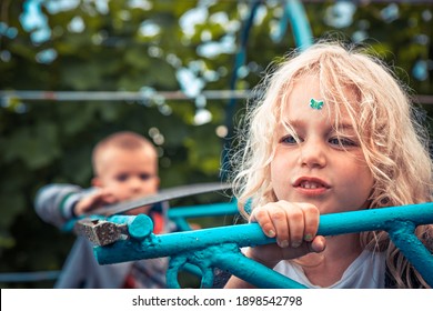 Beautiful Child Girl Portrait With Painted Nails And Stickers And Boy On Background Concept Carefree Childhood Lifestyle