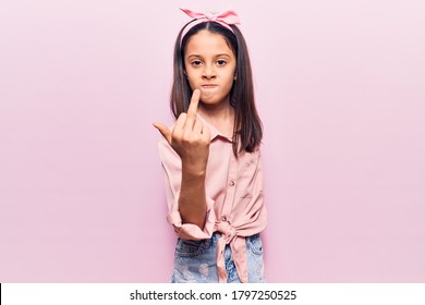 Beautiful Child Girl Wearing Casual Clothes Showing Middle Finger, Impolite And Rude Expression 