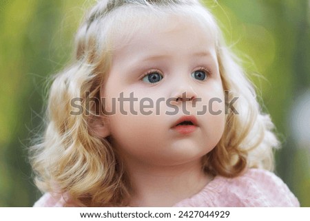 Similar – Image, Stock Photo Adorable little girl playing in a urban park