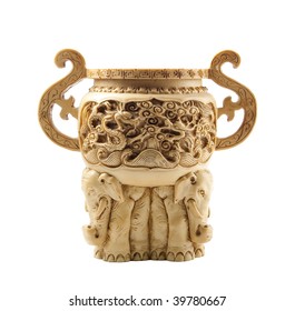 Beautiful chinese vase made of ivory, decorated with carvings and for elephants at the bottom.
