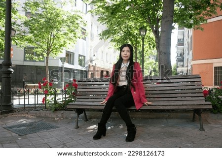 beautiful chinese woman executive in street