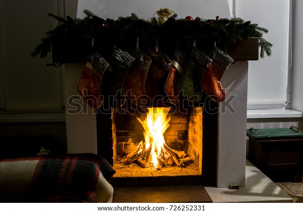 Beautiful Christmas Fireplace Decorated Garlands Socks Stock Photo