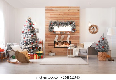 Beautiful Christmas interior of living room with decorated tree - Powered by Shutterstock