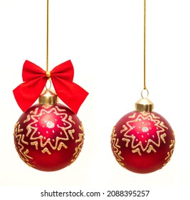 Beautiful Christmas Red Ball With Ornament Hanging On A White Background