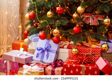 Beautiful christmas tree with many different presents beneath it. Celebrating Christmas concept - Powered by Shutterstock