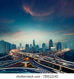 beautiful city interchange overpass at night in shanghai ,China - Shutterstock ID 730512142