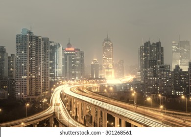 beautiful city interchange overpass at nightfall in shanghai - Shutterstock ID 301268561