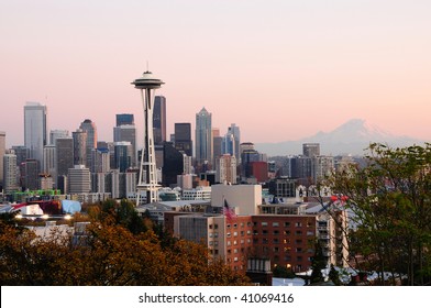 Beautiful city of Seattle glowing at dusk with Mount Rainier in the backdrop