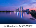 Beautiful city skyline and modern buildings scenery at night in Suzhou, China. The famous Jinji Lake landscape in Suzhou.