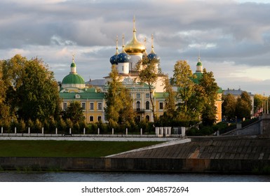 Beautiful City Tver Landscape View Of Imperial Palace On River Volga Embankment With Garden Trees, Dramatic Autumn Evening Sky And Russian Buildings. Small City Architecture Concept. Tver, Russia.