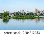 The beautiful cityscape of the Harrisburg with a tranquil lake in the foreground in Pennsylvania