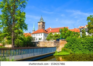 Beautiful cityscape of Pilsen, Czech Republic with dominant Water Tower, Vodarenska vez in Czech, photographed from park by Mlynska Strouha. Plzen city, Bohemia, Czechia. Tourist destination.