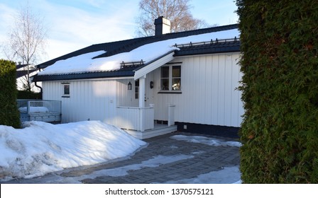 Beautiful Classic White House Exterior, Facade And Front In Snowy, Icy And Sunny Season - Norway