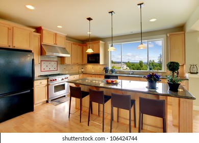 Beautiful Classic Wood Kitchen With Hardwood Floor.