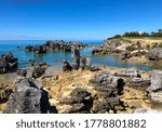 A beautiful, clear day at Tobacco Bay of St. George’s, Bermuda with Fort St. Catherine in the background.