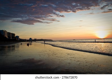 Beautiful clear sunset in touristic Murcielago beach, Manta, Ecuador