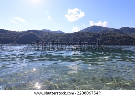Beautiful clear water of the Italian lake Orta. Photo was taken on a sunny day in summer.