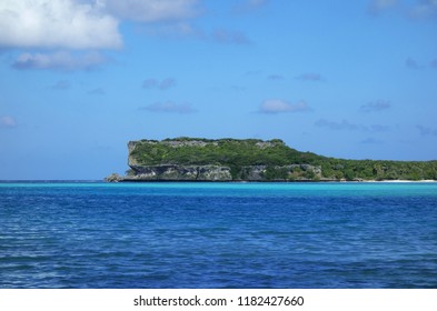 Beautiful Cliff In Front Of Lekiny's Bay Blue Water. Ouvéa, New Caledonia.