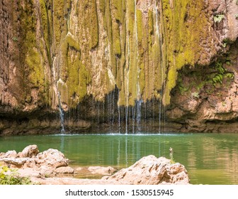 Beautiful Close Up View Of El Limon Tropical Waterfall With Lots Of Moss And Steaming Water, Front View Of The Final Part Of The Waterfall Located In The Dominican Republic Of The Samaná Peninsula.