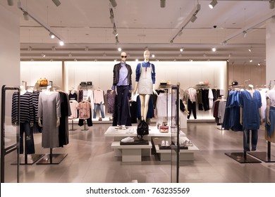 beautiful clothes in modern fashion shop - Shutterstock ID 763235569