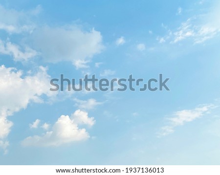 Beautiful clouds during spring time in a Sunny day. Blue sky and white fluffy clouds.