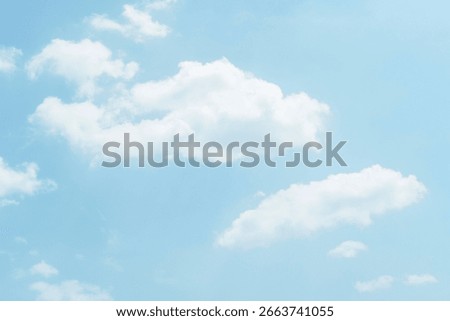 Beautiful clouds during spring time in a Sunny day. Blue sky and white fluffy clouds..