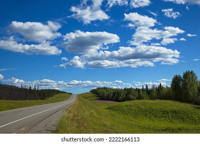 Beautiful Clouds Over Alaska Highway In British Columbia,Canada,North America

