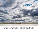 beautiful clouds in the sky over the fields