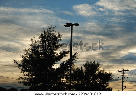 Beautiful Clouds and Sunset With Trees