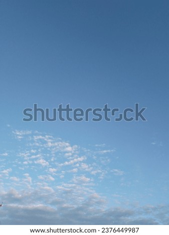 Beautiful cloudscape, bluish colour sky, bright clouds, small wandering clouds,dark blue sky