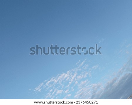 Beautiful cloudscape, bluish colour sky, bright clouds, small wandering clouds,dark blue sky, bright sky 