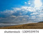 Beautiful cloudscape over the beach, during the afternoon