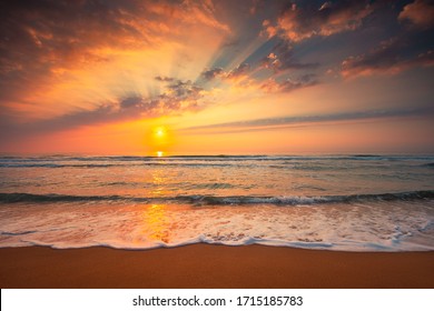 Beautiful cloudscape over the sea, sunrise shot - Shutterstock ID 1715185783