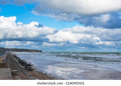 Beautiful cloudy skies over the landing beaches of Omaha Beach near the village of Vierville-sur-mer in Normandy, France