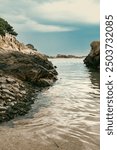 Beautiful coastal landscape in a quiet beach shore in quiet water in Mediterranean Sea, Costa Brava, Catalonia