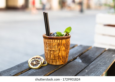 A Beautiful Cocktail In A Latin Style, An Interesting Glass And A Bright Outdoor Background.