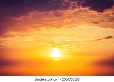 Beautiful colorful dramatic sky with clouds at sunset or sunrise.
