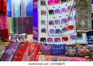 Beautiful colorful Indian sarees are displayed for sale at market place, Jaisalmer, India.